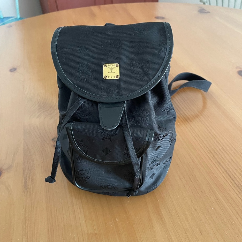 MCM Black Backpack with Gold Accent